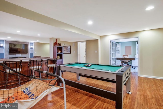 playroom featuring light hardwood / wood-style floors and billiards