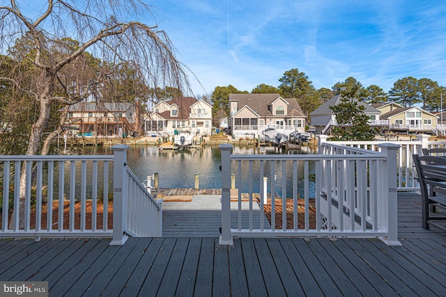 wooden deck with a water view