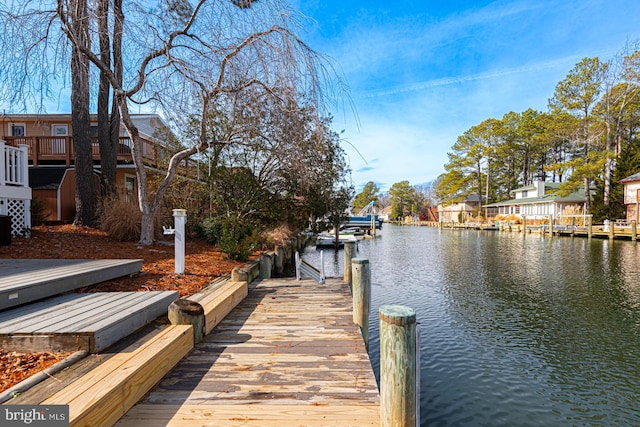 view of dock with a water view