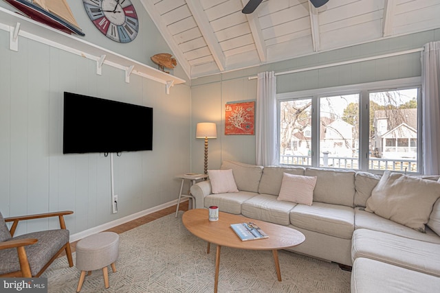 living room with wood ceiling, light hardwood / wood-style flooring, and lofted ceiling with beams