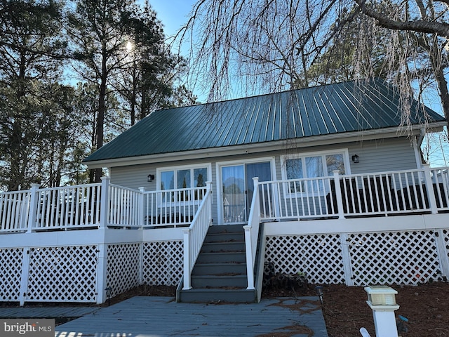 view of front of home featuring a wooden deck