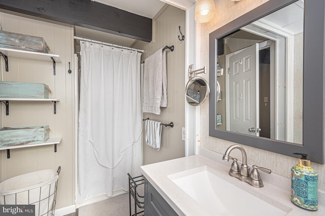 bathroom featuring vanity and walk in shower