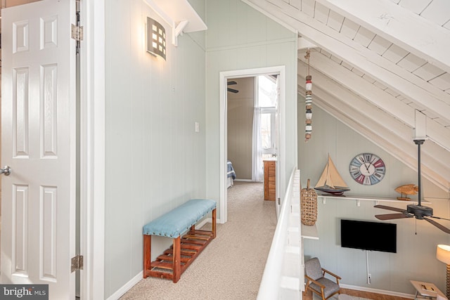 interior space featuring vaulted ceiling and carpet floors