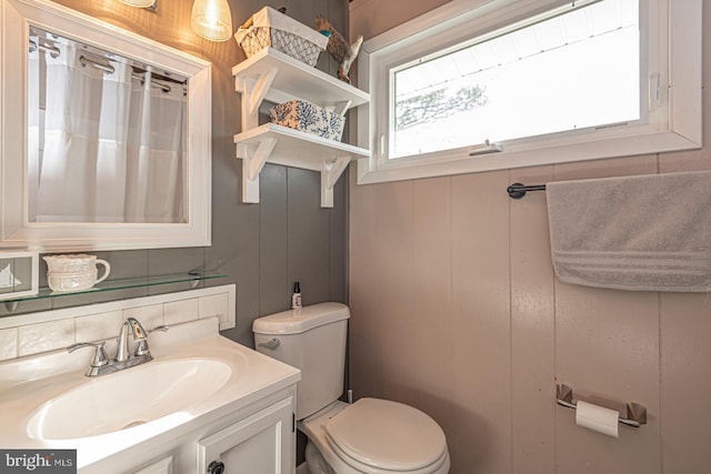 bathroom featuring sink and toilet