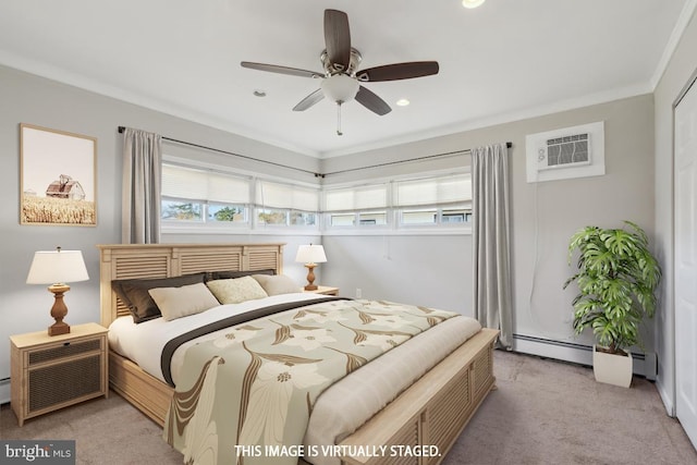 bedroom with light carpet, baseboard heating, and an AC wall unit