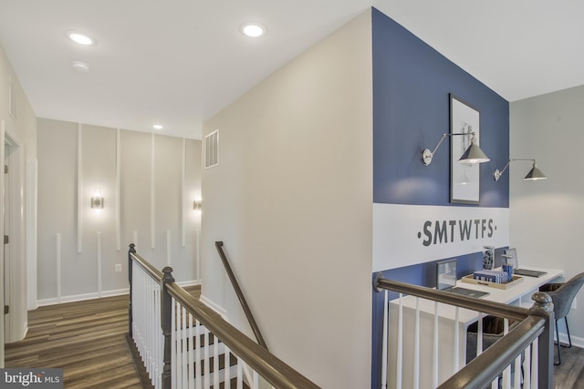 hall with dark hardwood / wood-style flooring