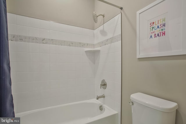 bathroom featuring toilet and shower / bath combo