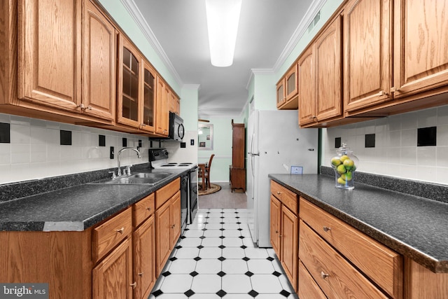 kitchen featuring sink, electric range oven, white refrigerator, tasteful backsplash, and ornamental molding