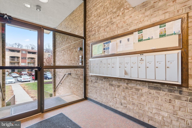 interior space with plenty of natural light and mail boxes