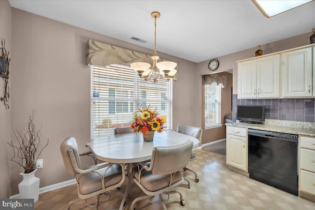 dining room featuring an inviting chandelier