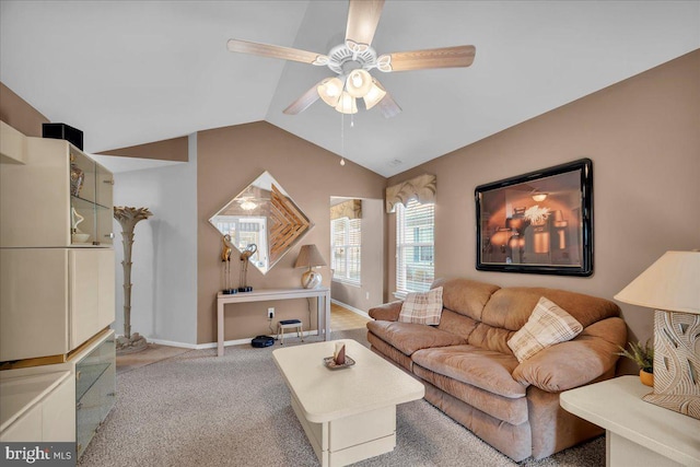 carpeted living room featuring lofted ceiling and ceiling fan