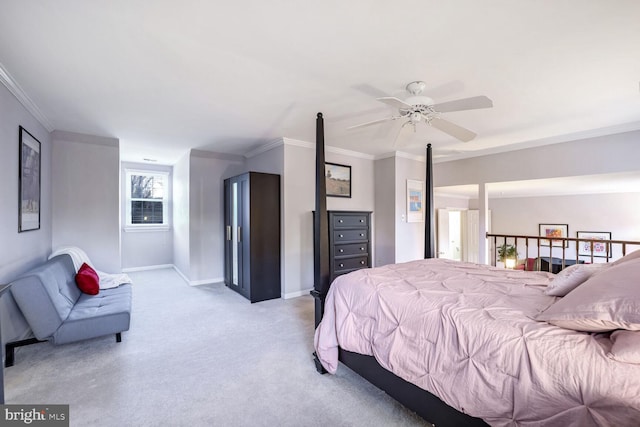 bedroom featuring crown molding, light colored carpet, and ceiling fan