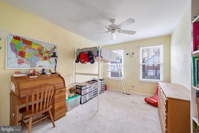 interior space featuring light carpet and ceiling fan