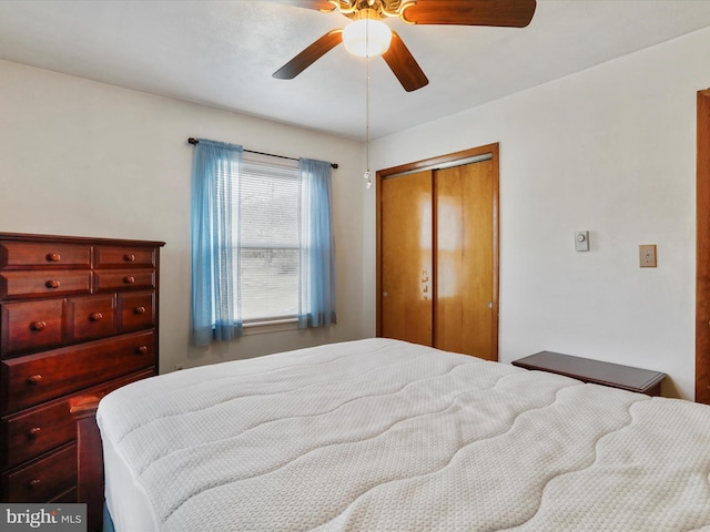 bedroom featuring a closet and ceiling fan