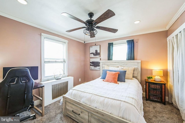 bedroom featuring ceiling fan, ornamental molding, radiator, and carpet