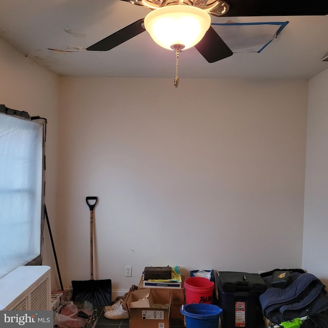 miscellaneous room featuring ceiling fan