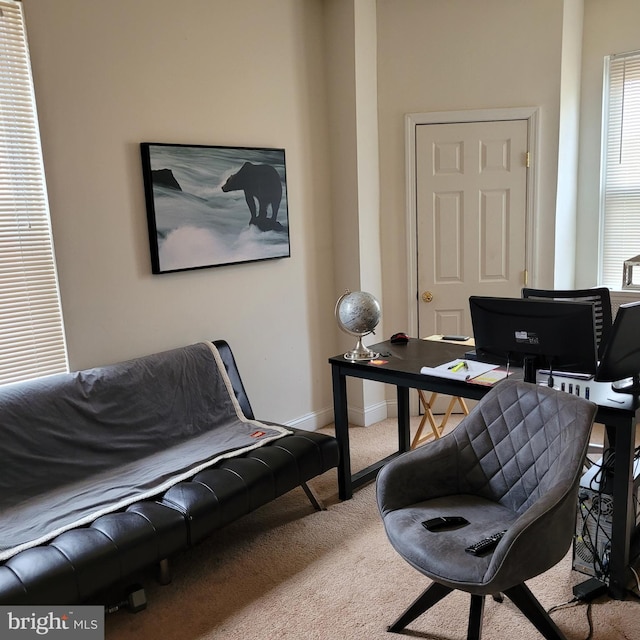 view of carpeted office space