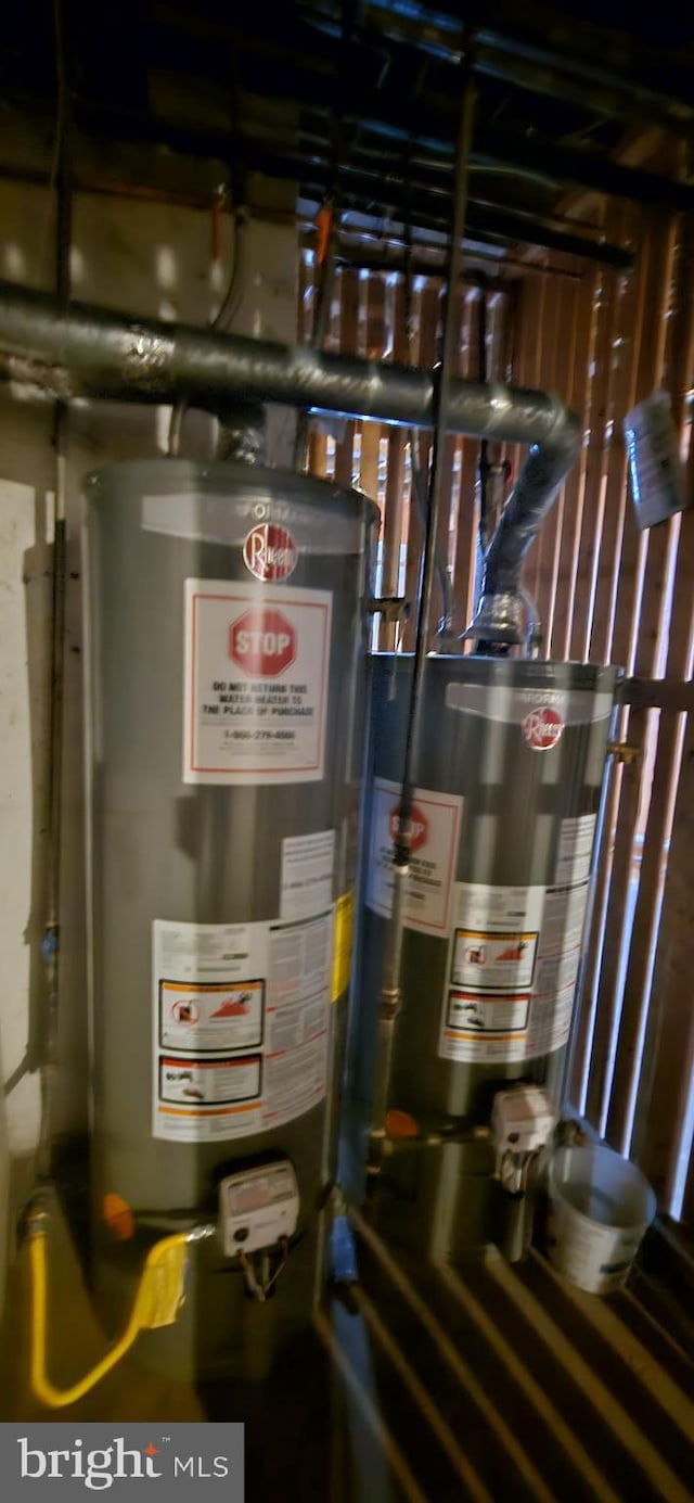 utility room featuring gas water heater