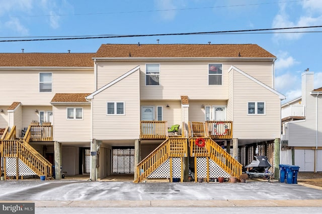 view of front of property featuring a carport