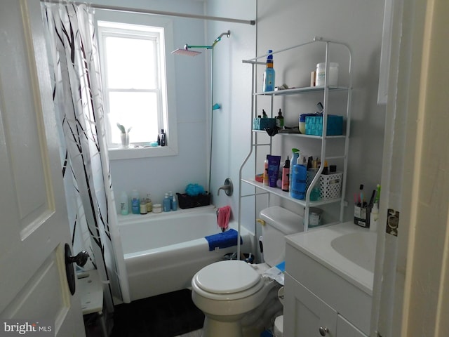 full bathroom featuring vanity, shower / bath combination with curtain, and toilet