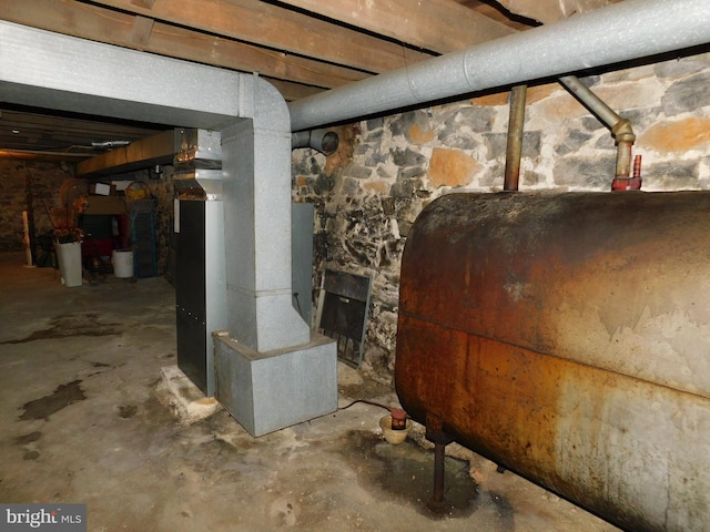 basement featuring heating unit