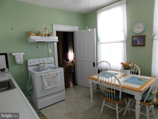 kitchen featuring white electric range