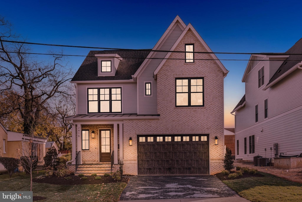 view of front of property with a garage