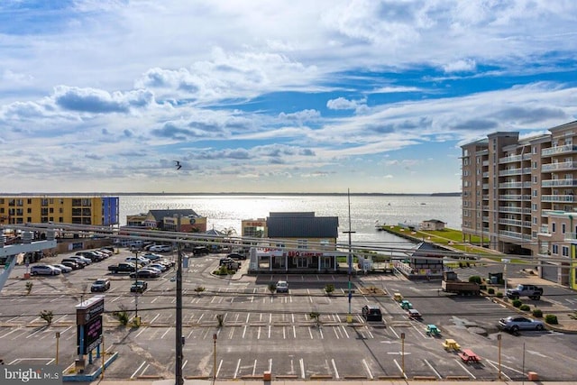 birds eye view of property featuring a water view