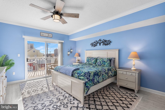 bedroom featuring ornamental molding, access to outside, ceiling fan, a textured ceiling, and light hardwood / wood-style flooring