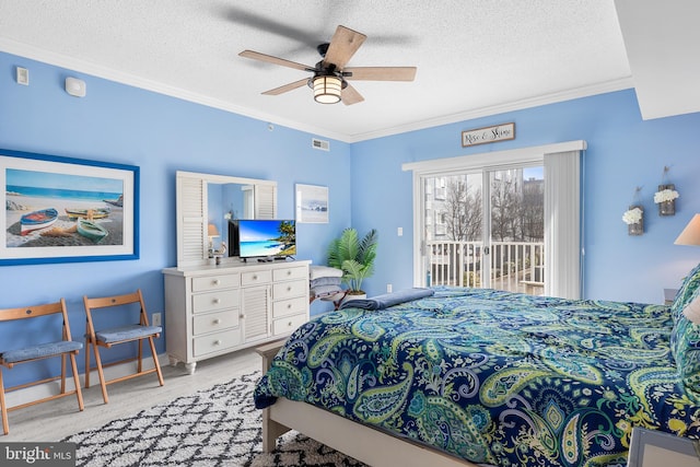 bedroom featuring crown molding, ceiling fan, access to exterior, light hardwood / wood-style floors, and a textured ceiling