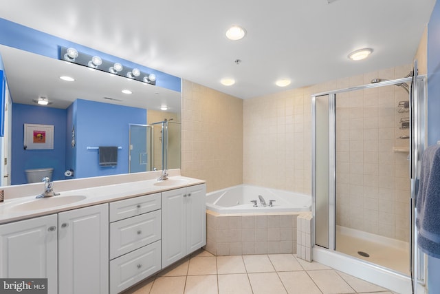 full bathroom with vanity, toilet, separate shower and tub, and tile patterned flooring