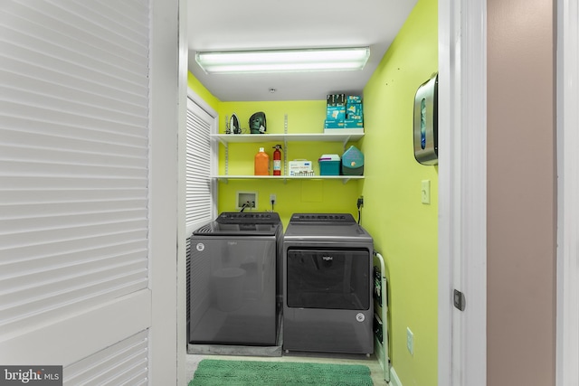 laundry area with washer and clothes dryer