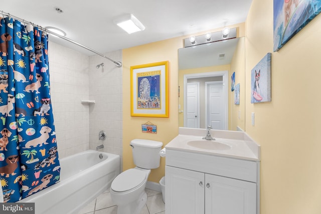 full bathroom with vanity, tile patterned floors, shower / bath combo with shower curtain, and toilet