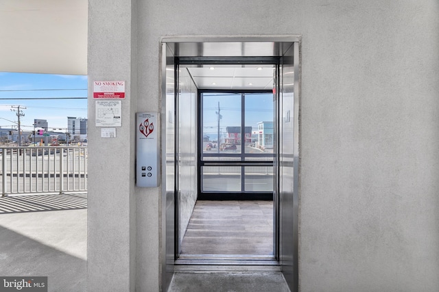 view of exterior entry with elevator