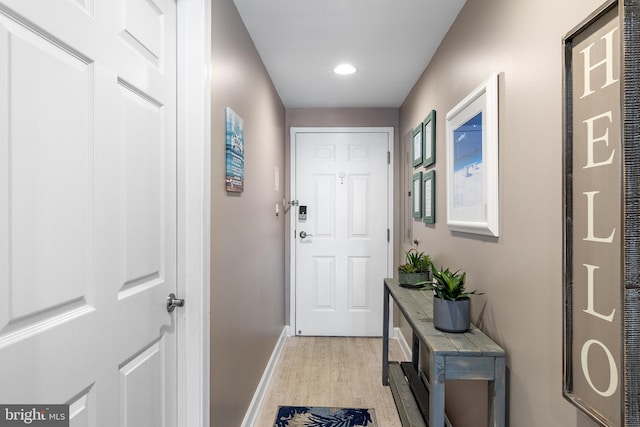 entryway with light hardwood / wood-style floors