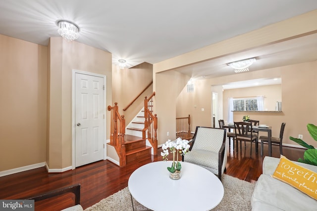 living area with dark hardwood / wood-style flooring