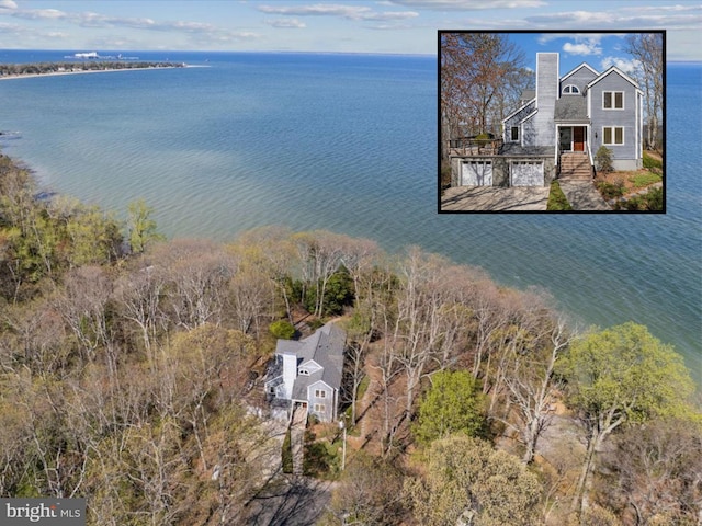 aerial view featuring a water view