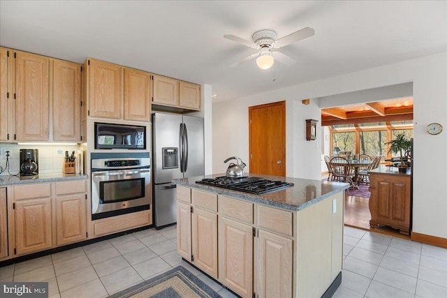 kitchen featuring light tile patterned floors, light brown cabinetry, ceiling fan, and black appliances