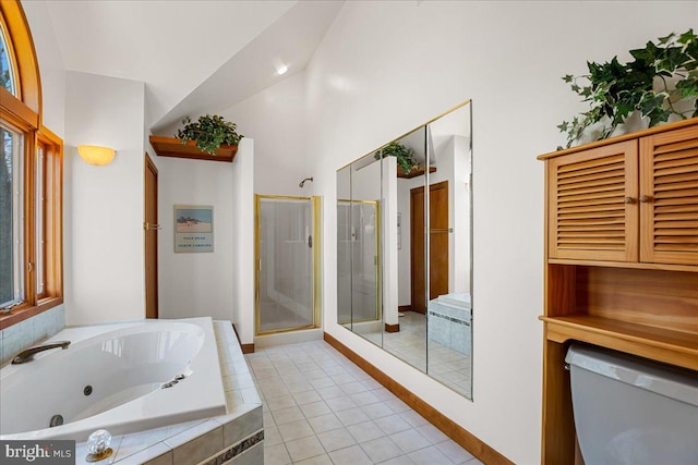 bathroom with a sink, tile patterned floors, baseboards, a tub with jets, and a shower stall