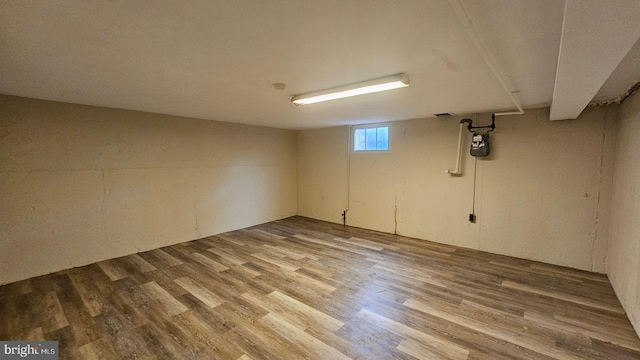 basement with wood-type flooring