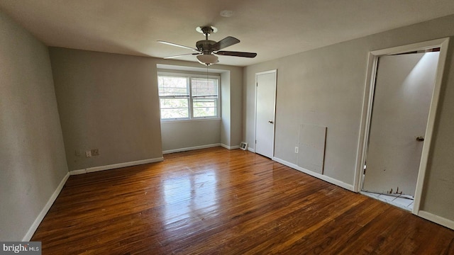 interior space with ceiling fan and wood-type flooring