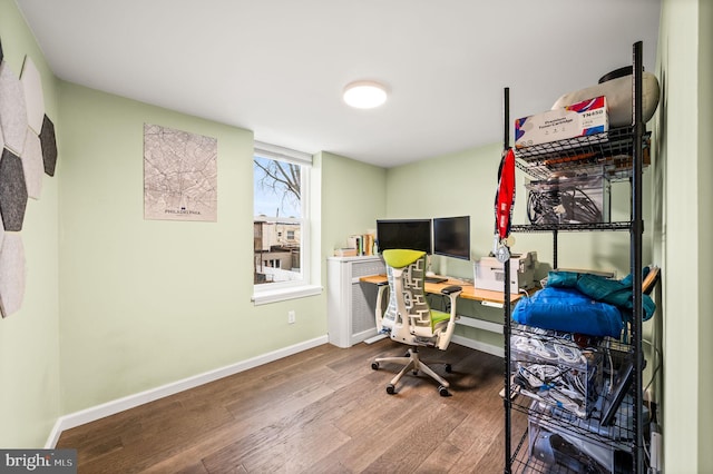 office space with hardwood / wood-style floors