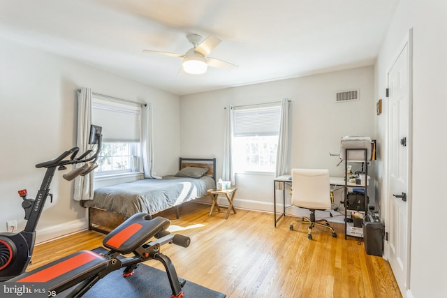 bedroom featuring ceiling fan and light hardwood / wood-style floors