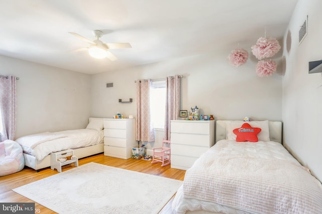 bedroom featuring ceiling fan and light wood-type flooring