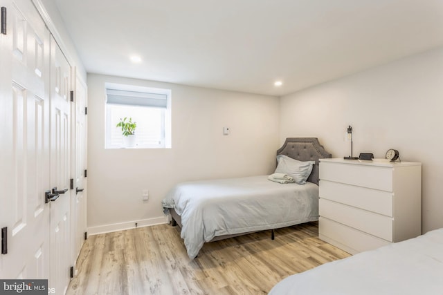 bedroom featuring light hardwood / wood-style floors