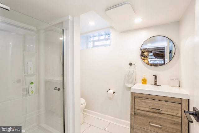 bathroom with tile patterned flooring, toilet, vanity, and a shower with shower door