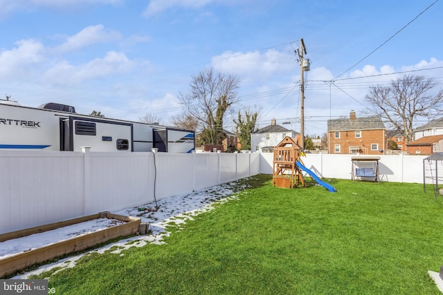 view of yard featuring a playground