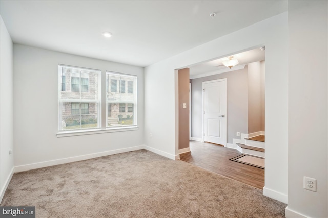 spare room featuring carpet flooring