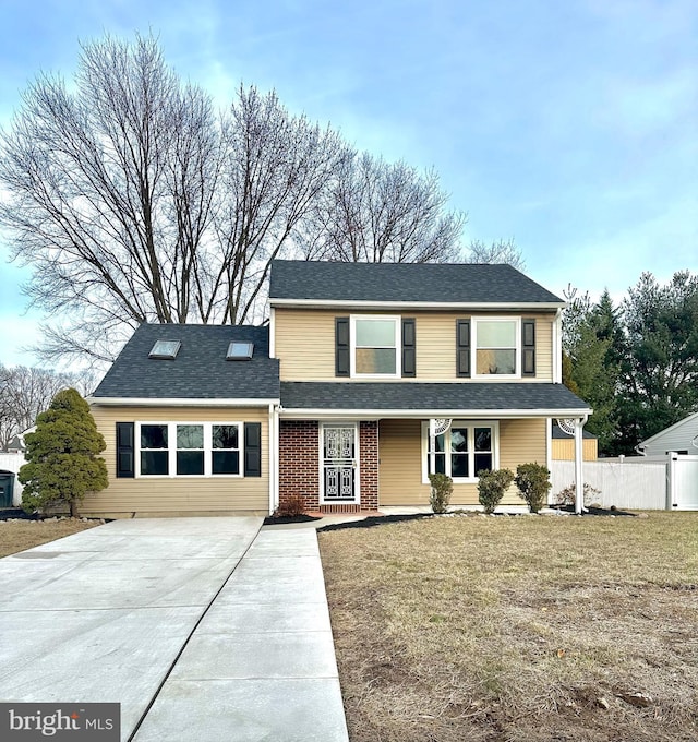 view of property featuring a front yard