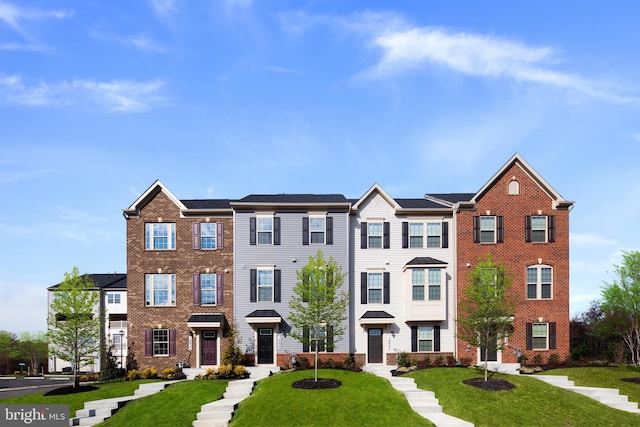 view of property with a front yard